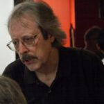 Kolm, Ron